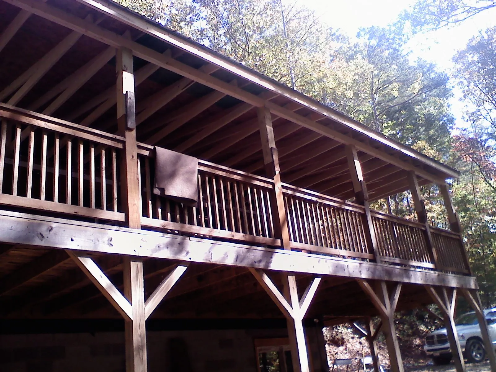 Timber framing under a new elevated porch and deck — Roof Leak Repair in Harford by Roofing Brothers